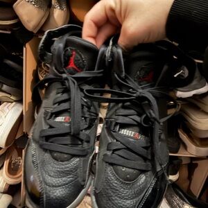 Jordan Black Basketball Sneakers with Red Jumpman Accents